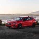 Subaru Impreza in Red parked by the lake