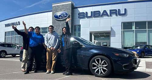 Jerome, Idaho's Sergio with his Blue Velvet Metallic 2017 Chevy Malibu LT assisted by Lizet at Twin Falls Subaru