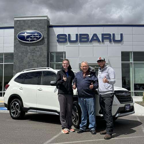 Kaden with his Happy Driver Ron (from Gooding, Idaho) with his new Crystal White Pearl 2024 Subaru Forester Touring