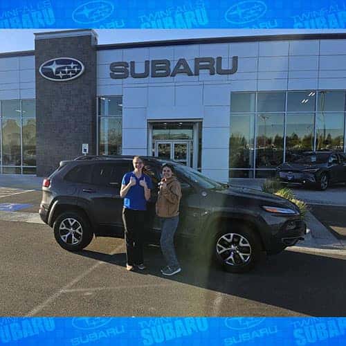 Happy Drivers Brayden & Brittany - with her new Granite Crystal Metallic 2015 Jeep Cherokee Trailhawk- assisted by Michaela Hawley