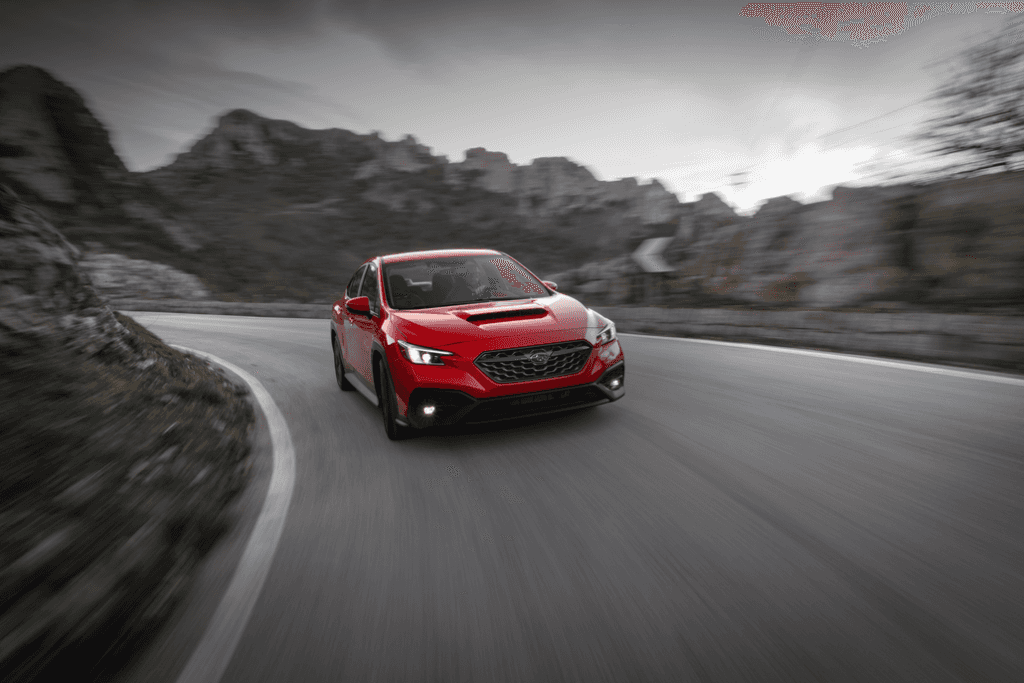 Subaru WRX Driving on a Mountain Road Front 3/4 View