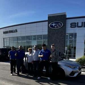 Kenneth from Jerome, Idaho, with his Ice Silver Metallic 2024 Subaru Impreza RX in front of Twin Falls Subaru