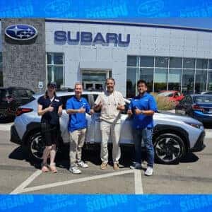 James, from Burley, Idaho, with his Ice Silver Metallic 2024 Subaru Crosstrek Limited in front of Twin Falls Subaru