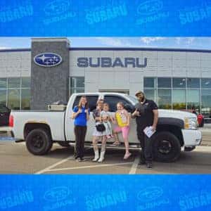 Derek & Taeli from Rogerson, Idaho, with their Summit White 2012 Chevy Silverado 1500 LT in front of Twin Falls Subaru