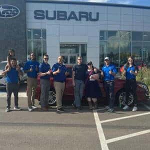 Jase & His Wife from Gooding Idaho with their Venetian Red Pearl 2015 Subaru Impreza Premium in front of Twin Falls Subaru