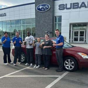 Ray & family from Kimberly, Idaho with his Sonoma Sunset 2008 Nissan Altima 2.5 SL in front of Twin Falls Subaru