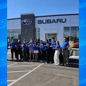 Nick & Audrey from Filer, Idaho with their Crystal Black Silica 2024 Subaru Crosstrek Limited and Product Specialist Cory Budden in front of Twin Falls Subaru.