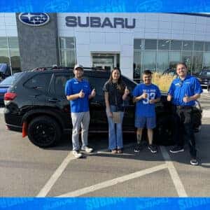 Jorge & Diana, from Burley, Idaho, with their Crystal Black Silica 2024 Subaru Forester Sport the Magic Valley's #1 Volume Automotive Retailer - Twin Falls Subaru, and Product Specialist Tyler Morrison.