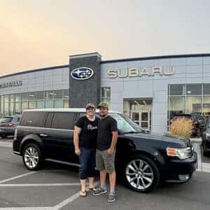 Daniel & Candace, from Jerome, Idaho, with their 2016 Ford Edge Titanium AWD in front of Twin Falls Subaru - assisted by Purchase Advisor Lizet Ramos.