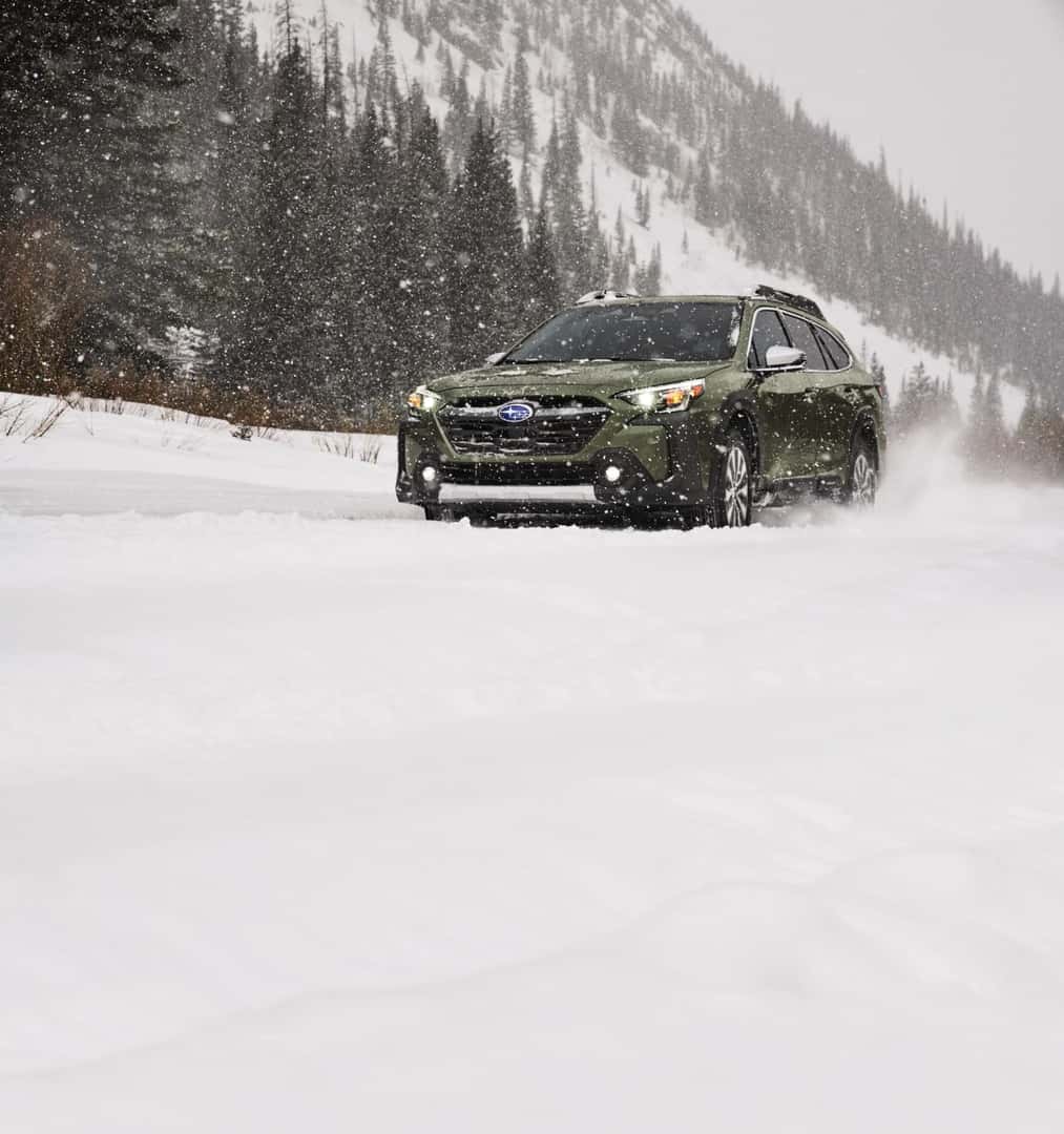Subaru Outback Driving in the Snow