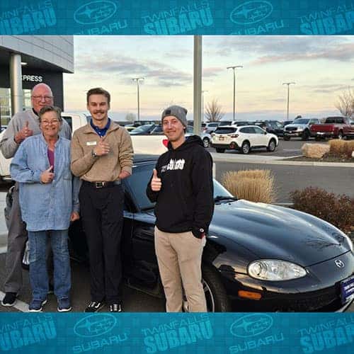 Regina, from Filer, Idaho with her Black Cherry Mica 2004 Mazda MX-5 Miata Convertible at Twin Falls Subaru.