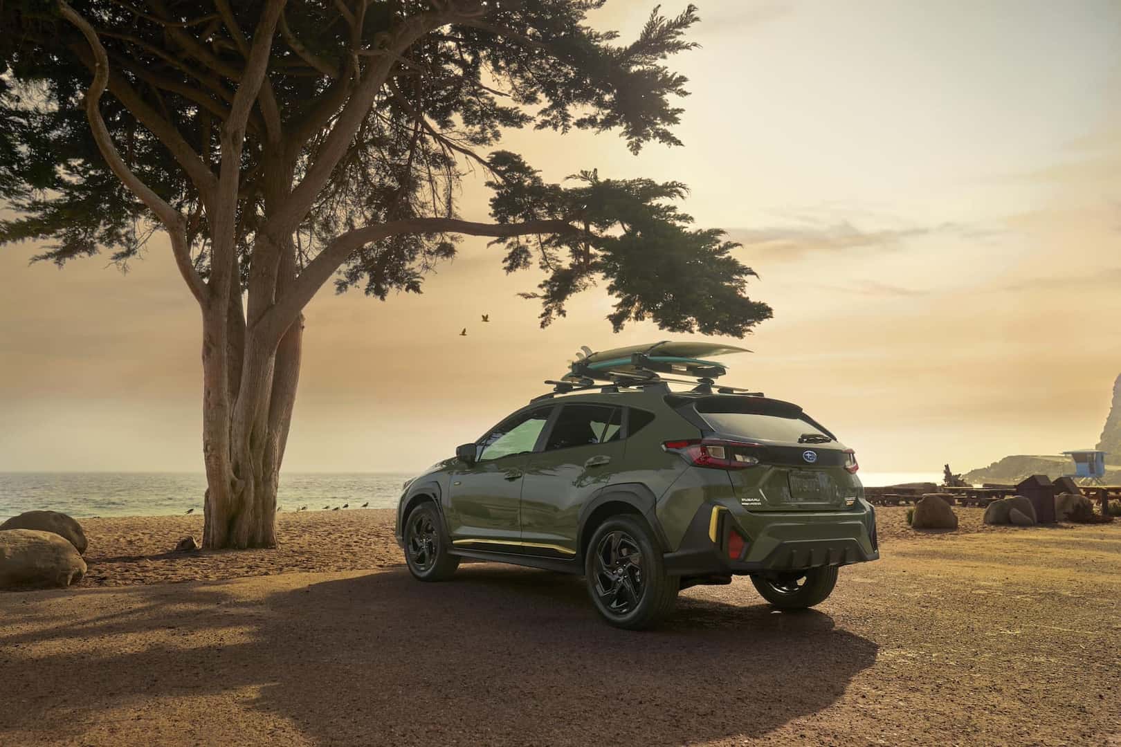 2024 Subaru Crosstrek Alpine Green on beach