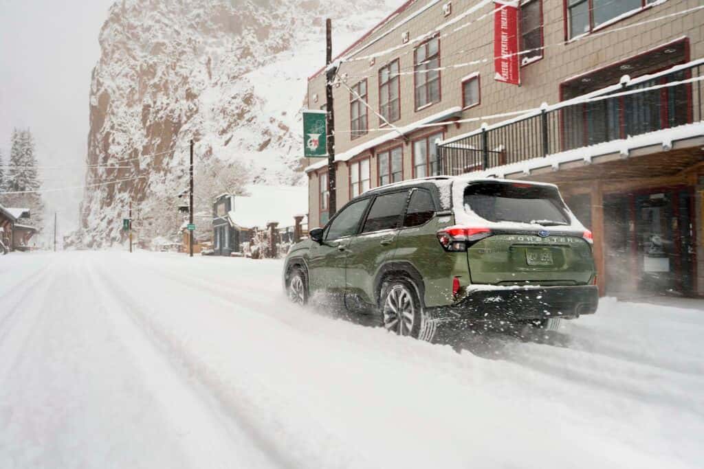 2025 Subaru Forester Hybrid Rear View Driving in the Snow