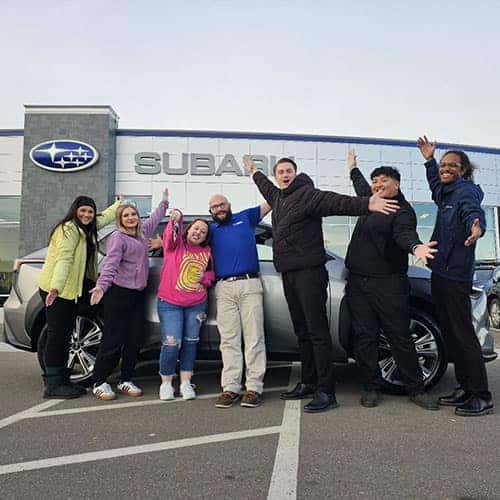 Timberly, from Gooding, Idaho with her Smoked Carbon 2024 Subaru Solterra Limited - assisted by Product Specialist Curtis Madson at Twin Falls Subaru.