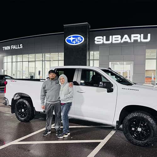 Maribel & Franklin, from Wendell, Idaho, with their Summit White 2022 Chevy Silverado 1500 - assisted by Purchase Advisor Paola Orozco at Twin Falls Subaru