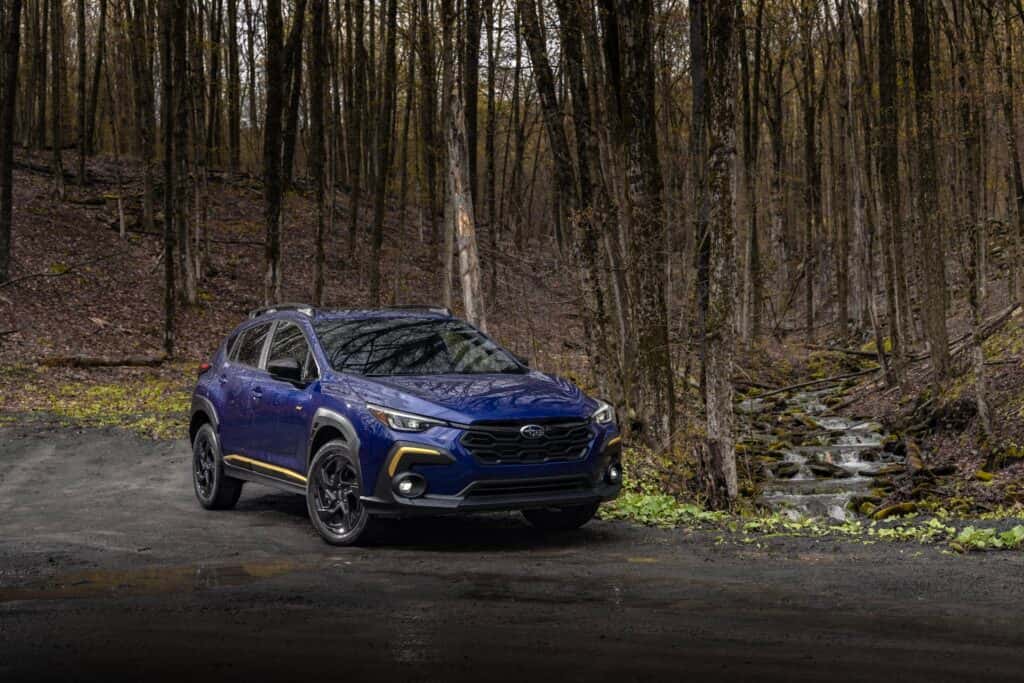 2024 Subaru Crosstrek Sport Front View in the Woods.
