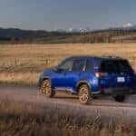 2025 Subaru Forester Sapphire Blue Pearl on gravel road