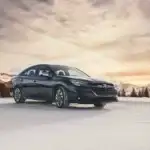 2025 Grey Subaru Legacy in front of Mountains and Trees