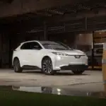 2026 White Subaru Solterra in rustic building