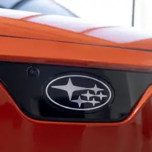 2026 Subaru Uncharted Habanero Orange Metallic emblem