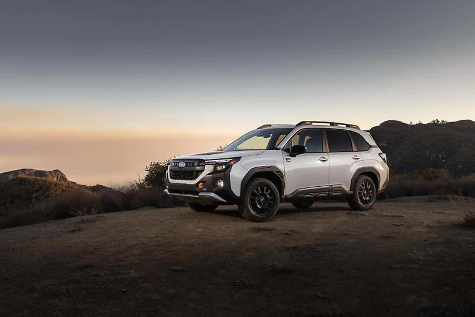 The Award-Winning 2026 Subaru Forester Wilderness, Parked On A Cliff As The Sun Goes Down