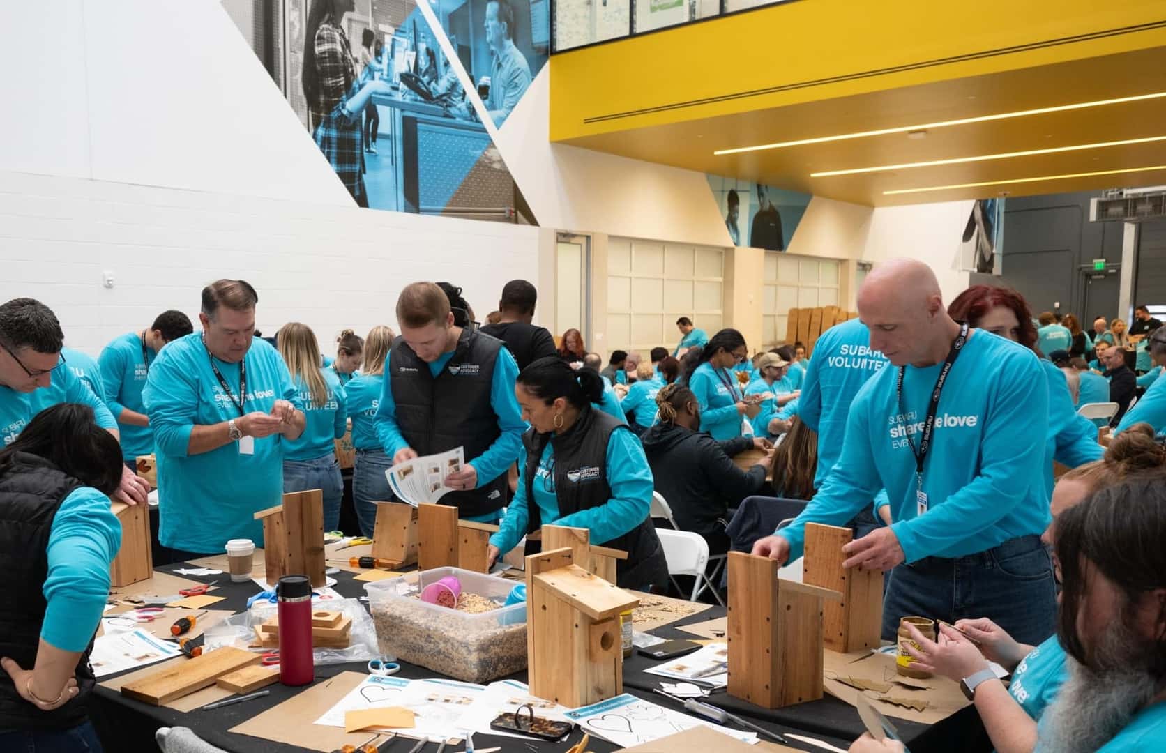 Group of Subaru Employees Building Birdhouses
