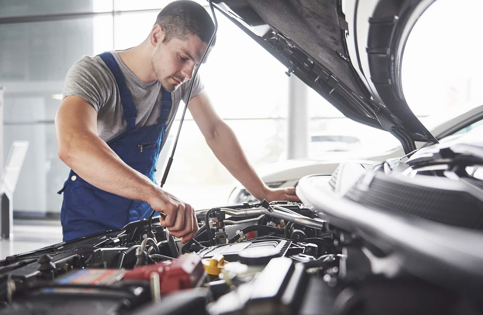Auto mechanic working in the Team Chevrolet service center