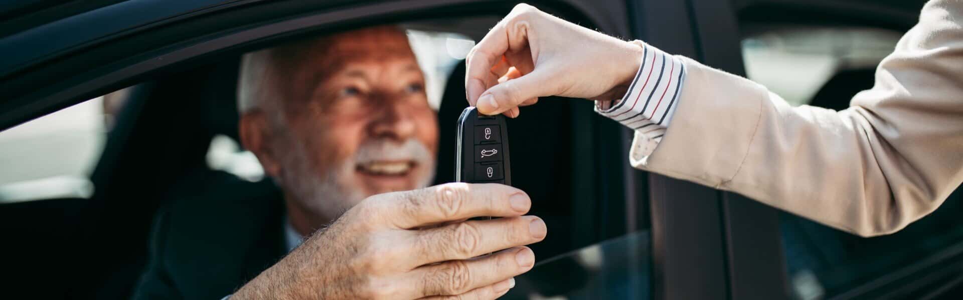 Financing - Old Man Getting Key For Car Banner