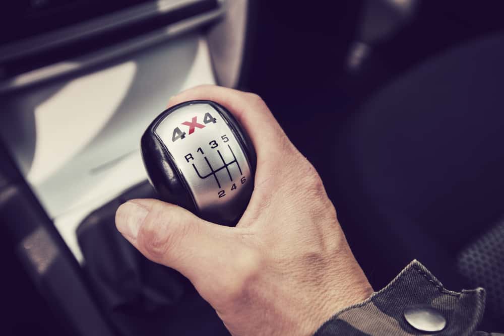 Close-up of a hand on a 4WD gear shift