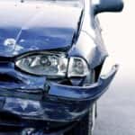 Blue Car With Body Damage