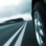 Car on the road showing the wheel moving