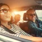 Couple taking a road trip in a car