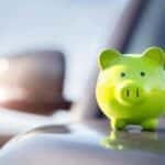 Green Piggy Bank on a Car Door