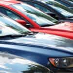 line of used cars in a row