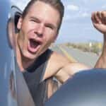 Man Driving With the Windows Down