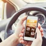 Man researching car insurance on a smartphone