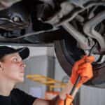 Mechanic Inspecting a Vehicle