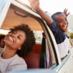 Mom and Son Relaxing With Car Windows Down