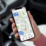 Person Using Map App in a Car