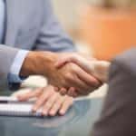 Shaking Hands With a Car Salesperson