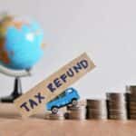 Tax Refund Concept With Stack of Coins