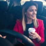 Woman Driving a Car to Work
