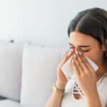 Woman Sneezing From Allergies