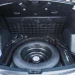 Spare tire in the trunk of a car