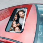 Family on a road trip in a vehicle
