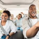 Happy family in the car for a roadtrip