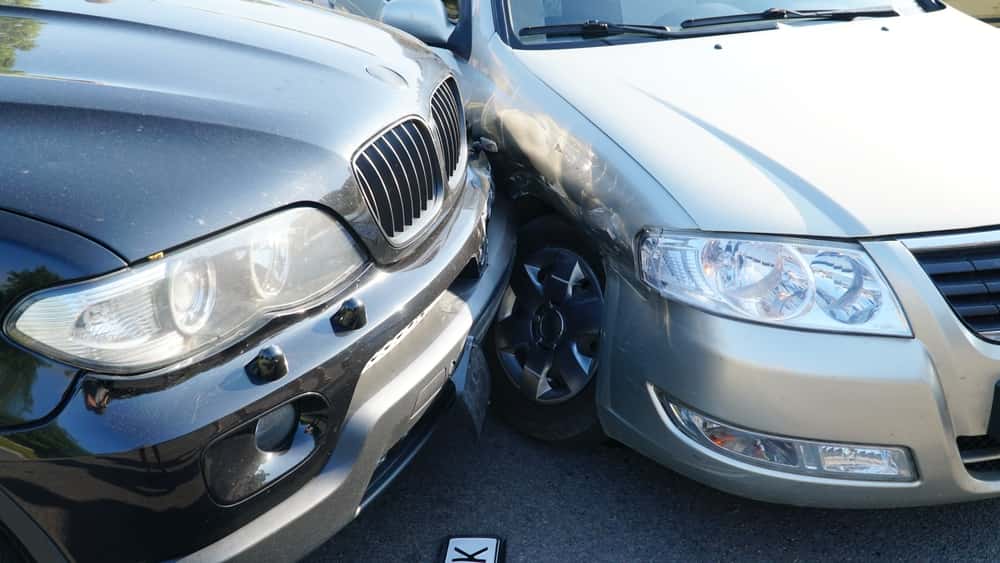 Two vehicles with damage after a collision