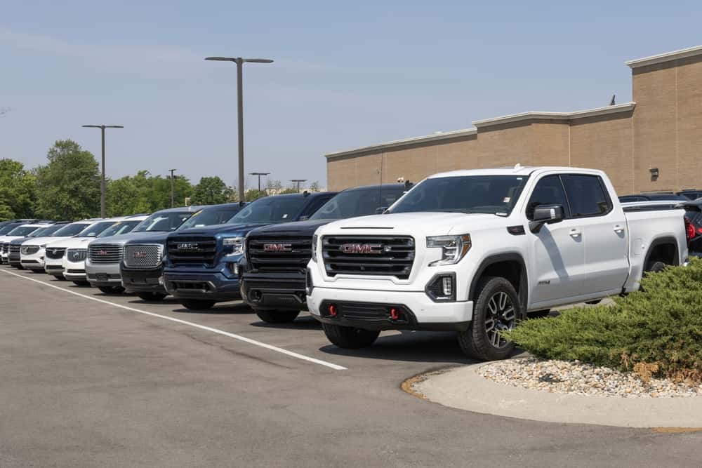 GMC trucks on a dealership lot