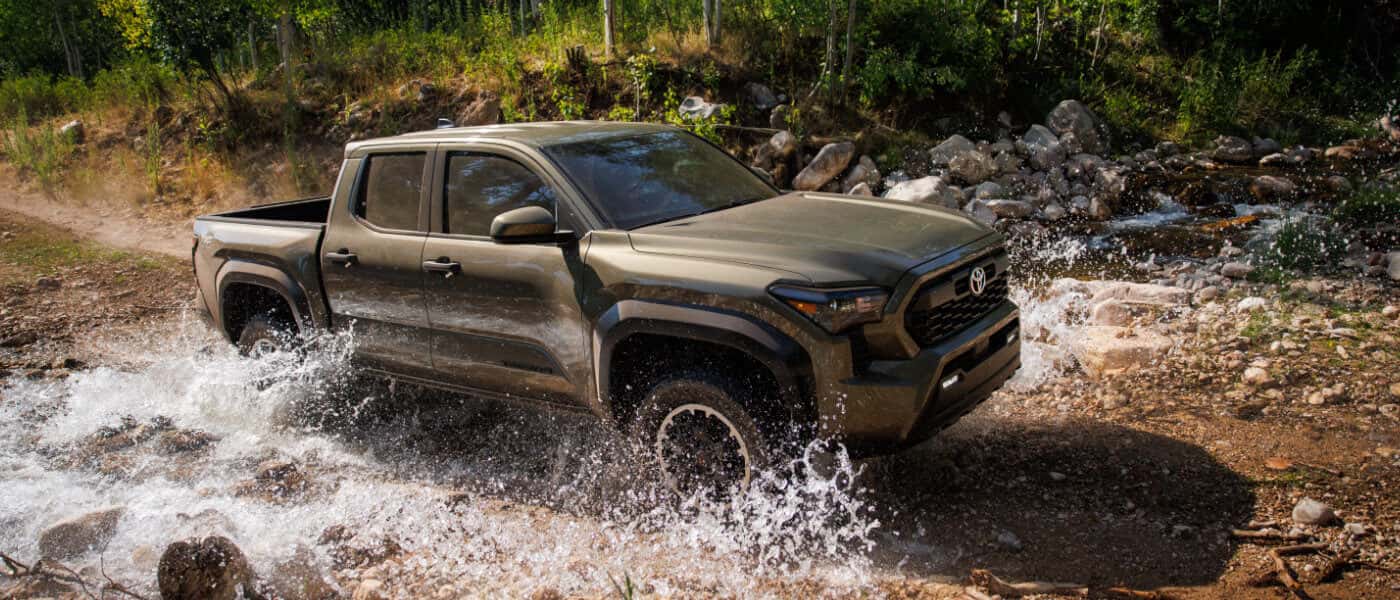 2025 Toyota Tacoma Exterior Driving Through Stream