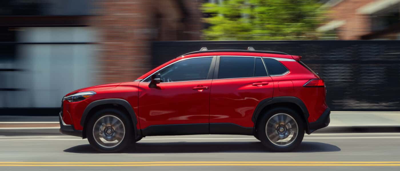 2026 Toyota Corolla Cross Exterior Driving On Blurred Street
